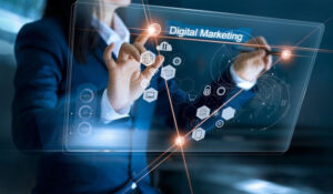 Noticias Marketing muestra a una persona interactuando con una pantalla digital con iconos y gráficos, representando noticias marketing y las últimas tendencias en marketing digital. Esta imagen es adecuada para artículos sobre estrategias de marketing y marketing en redes sociales.
